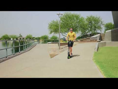 Electric Scooter for Teens and Adults – 15.5 MPH, 12.4 Mile Range – Dual Suspension, 8" Solid Tires, Folding Frame – Madd Gear Terra-X - Black Green